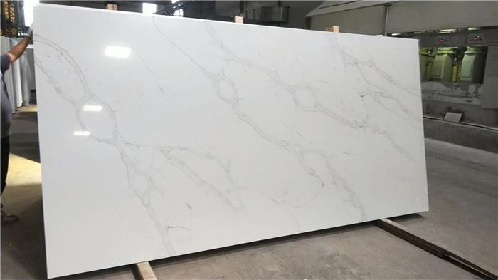 white and gold quartz worktop for apartment